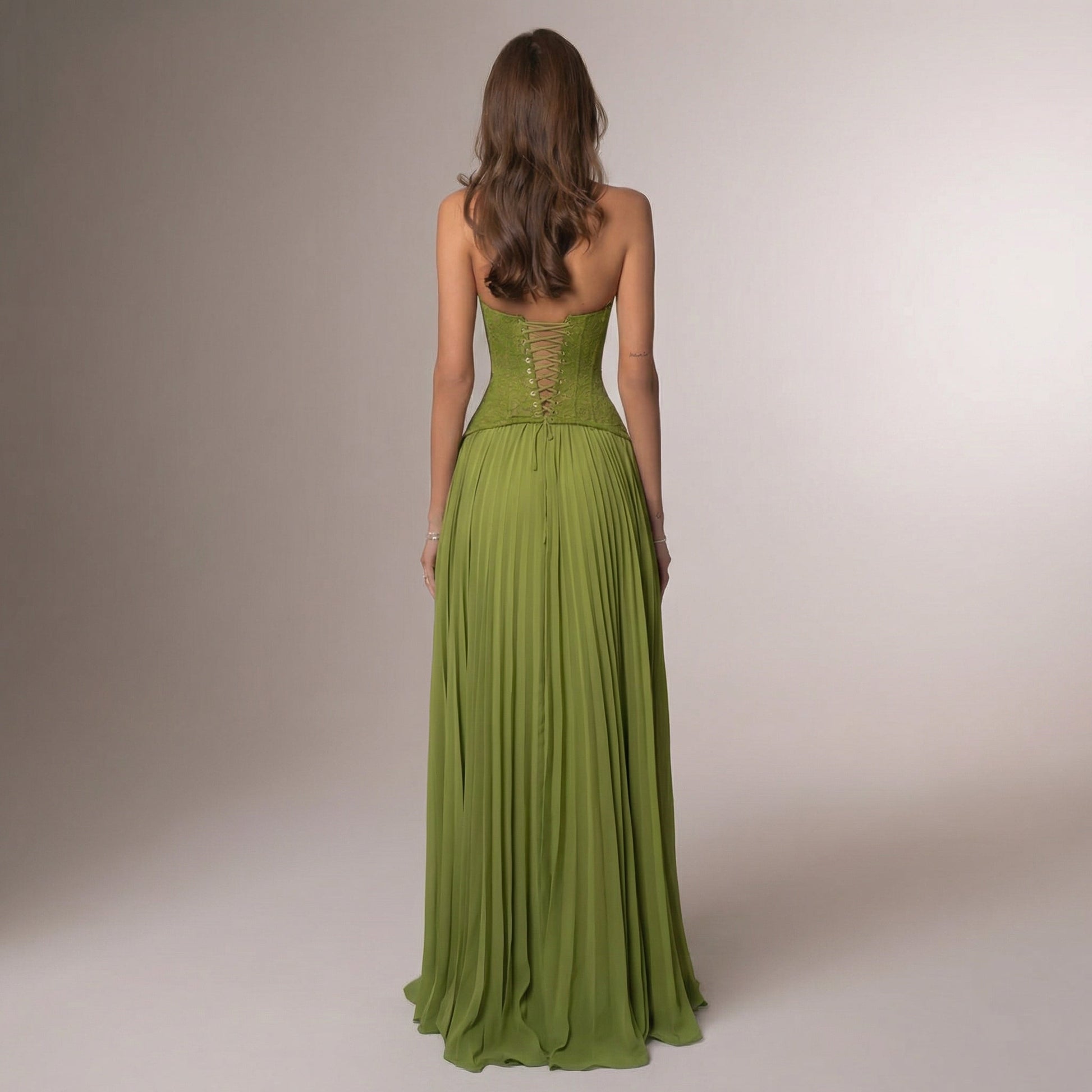 Back view of lime green halter maxi dress with lace-up corset closure detail for women