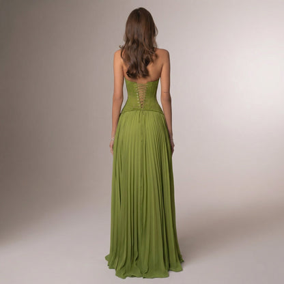 Back view of lime green halter maxi dress with lace-up corset closure detail for women