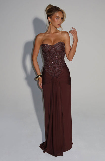 Brown sequin embellished strapless evening gown with draped floor-length skirt