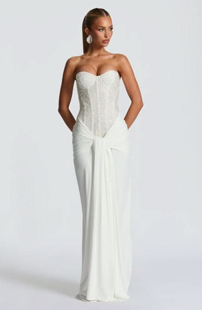 Brown sequin embellished strapless evening gown with draped floor-length skirt