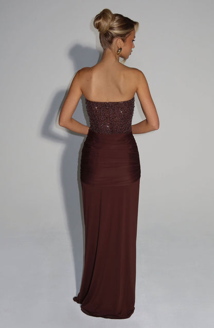 Back view of brown beaded strapless maxi dress with open back detail