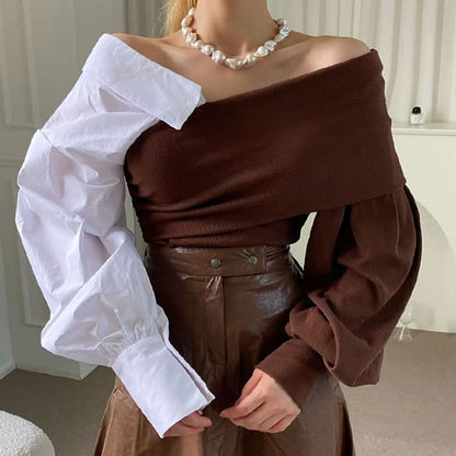 Brown and white two-tone sweater with off-shoulder silhouette and pearl necklace detail