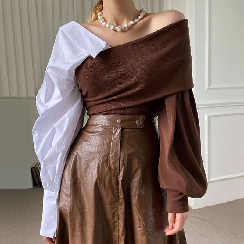 Brown and white two-tone sweater with off-shoulder wrap design and pearl necklace
