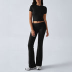Black fitted short-sleeve crop top and flare pants outfit