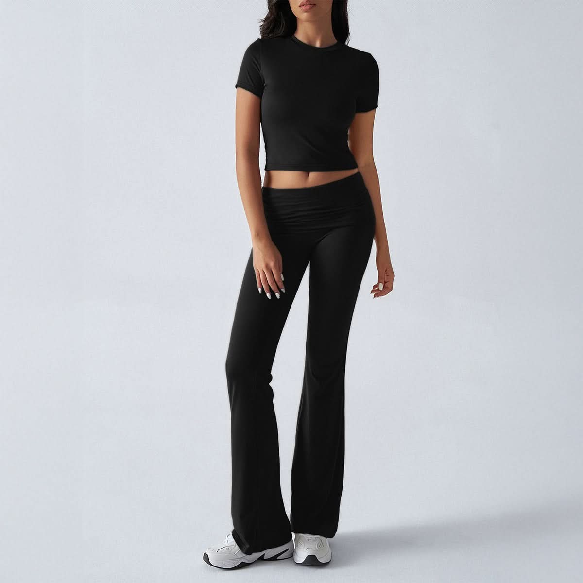 Black fitted short-sleeve crop top and flare pants outfit