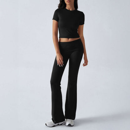 Black fitted short-sleeve crop top and flare pants outfit