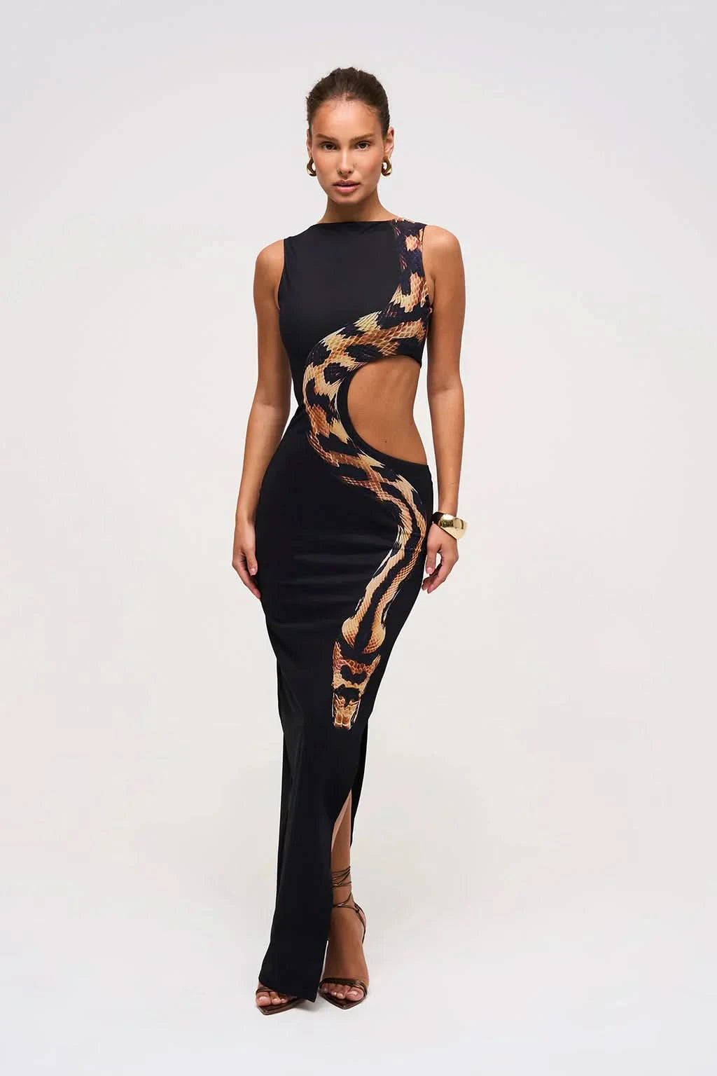 Black snake print maxi dress with high neck and strategic cutout design