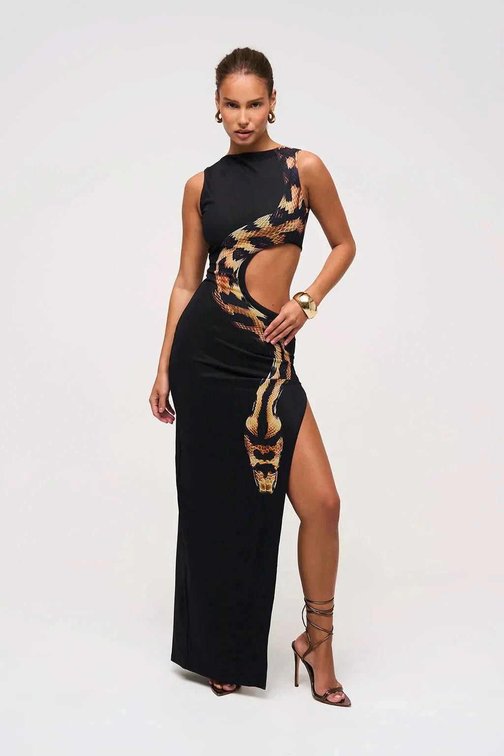 Black maxi dress with golden snake print and waist cutout for women
