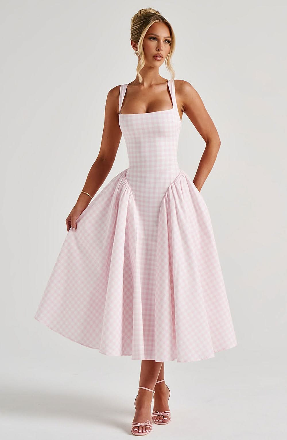 Pink and white gingham midi dress with fitted bodice and pleated skirt