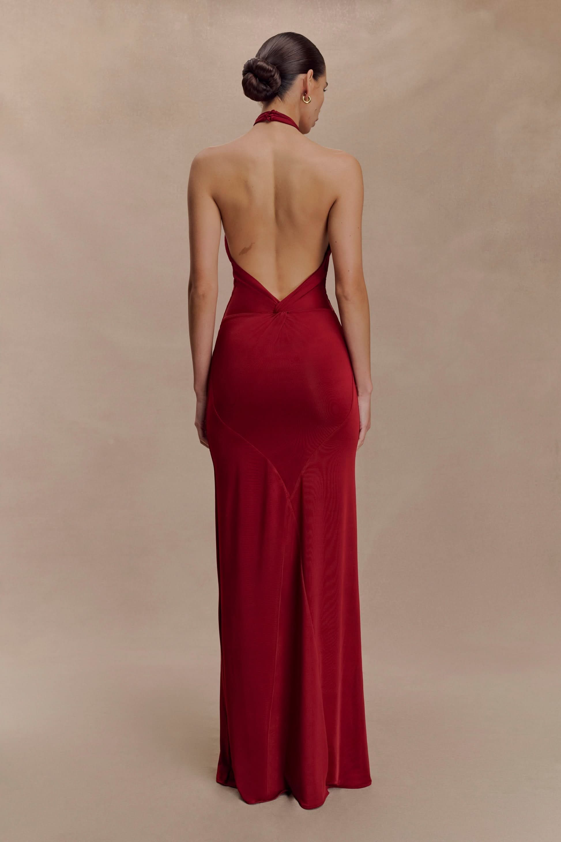 Red halter maxi dress back view with twisted detail