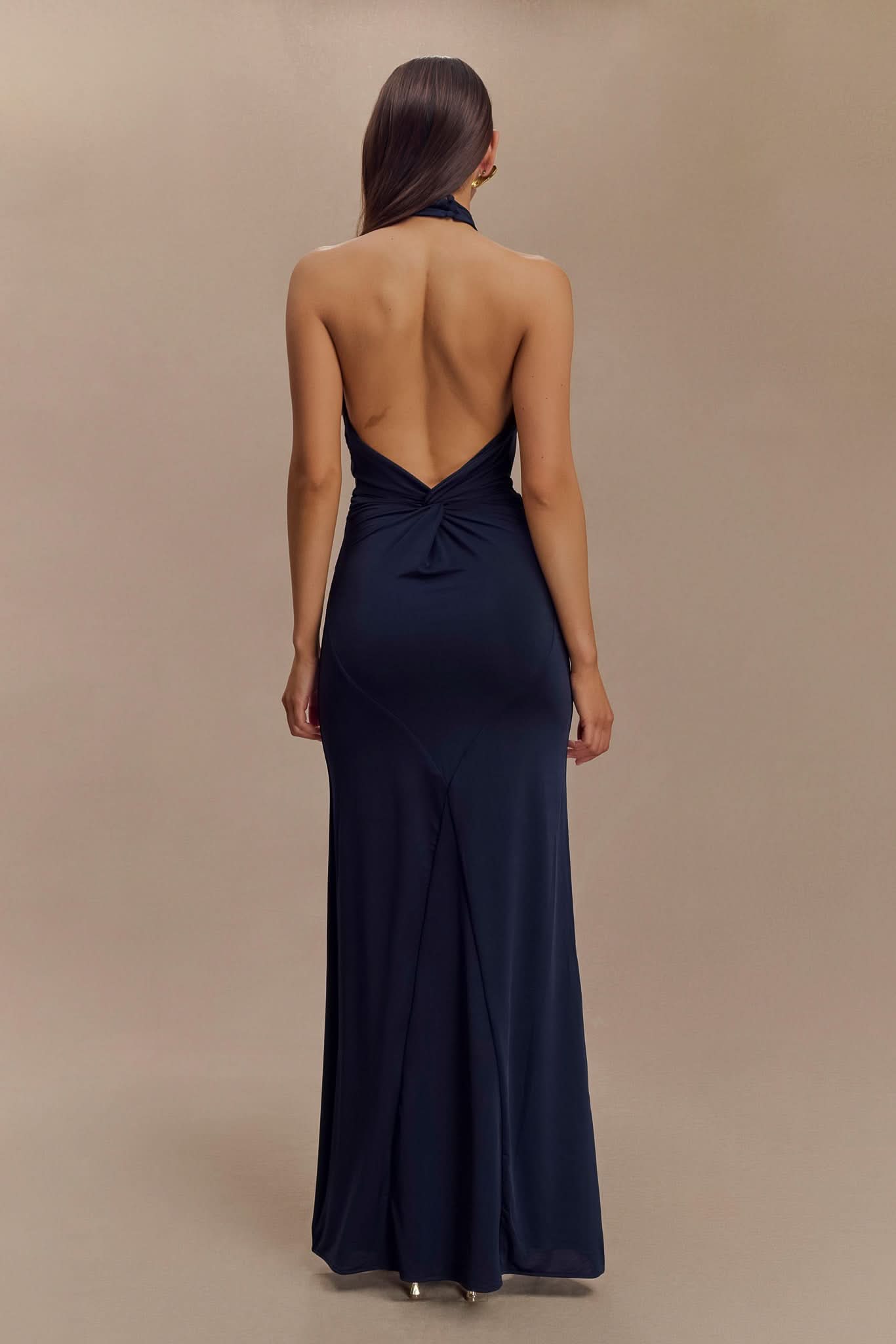 Navy halter maxi dress back view showing open backless design