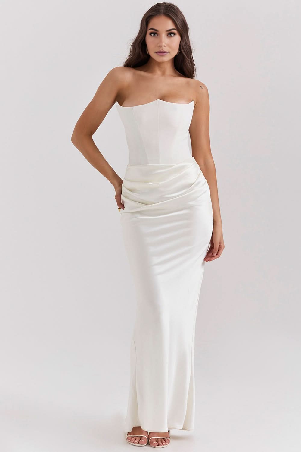 Ivory strapless corset maxi dress with draped ruched waist and sleek fit