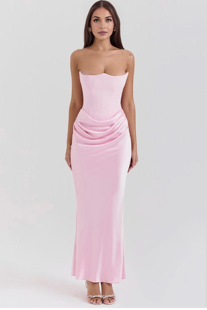 Pink strapless corset maxi dress with ruched waist detail and fitted bodice