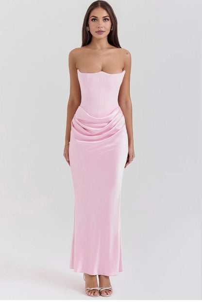 Pink strapless corset maxi dress with ruched waist detail and fitted bodice