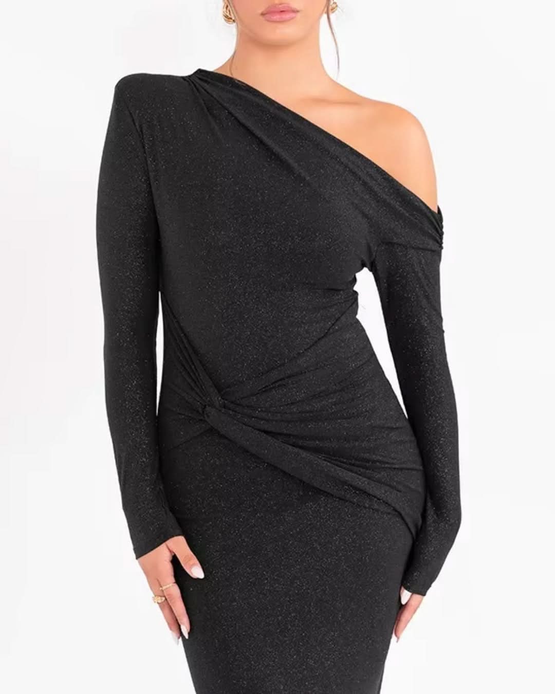 Close-up of black sparkle maxi dress with asymmetrical one-shoulder design