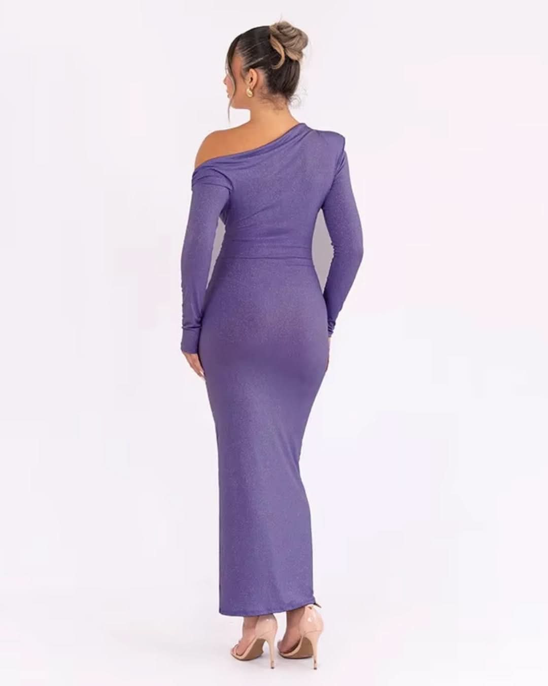 Back view of purple maxi dress with asymmetrical neckline and fitted silhouette