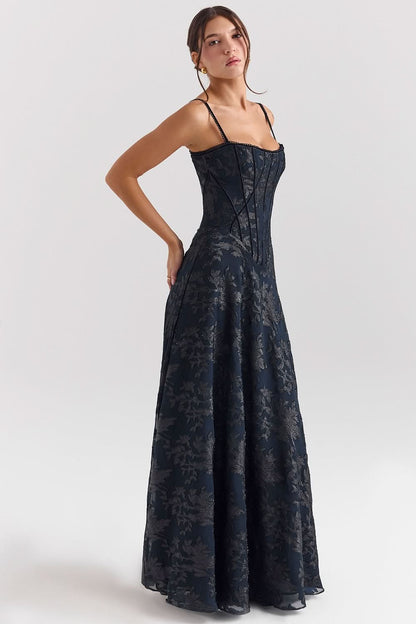 Side view of navy chiffon maxi dress showing corset bodice detail