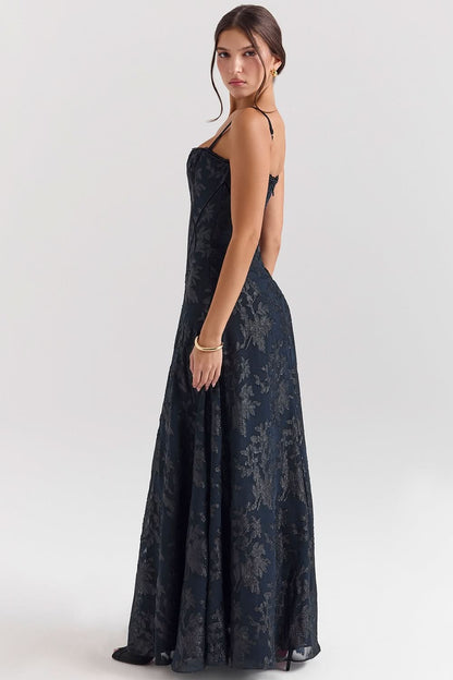 Back view of navy chiffon maxi dress with open back design