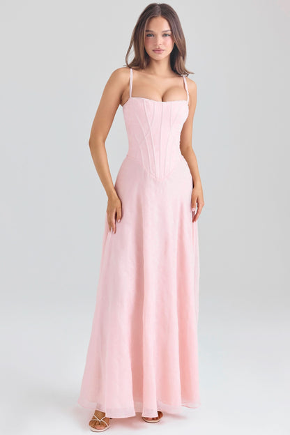 Pink chiffon maxi dress with corset-style bodice and flowing skirt