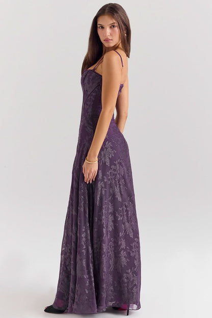 Back view of purple chiffon dress showing open back design