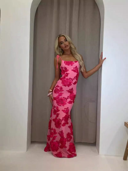 pink floral maxi dress with fuchsia flower print and tie-shoulder sleeveless design