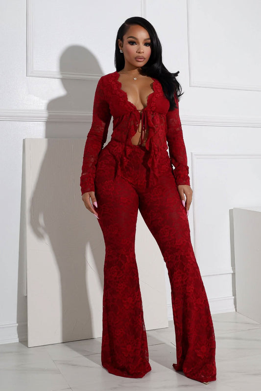 Red lace long-sleeve bodysuit with tie-front closure and flared pants