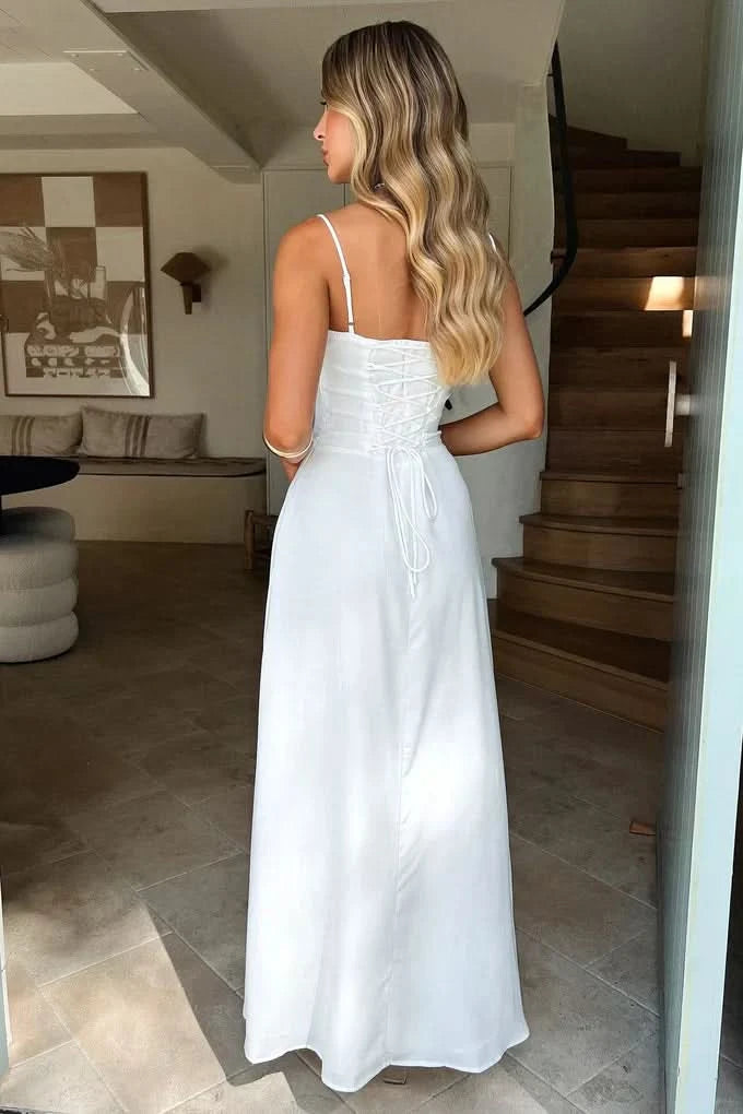 White maxi dress with gathered bust and thin shoulder straps