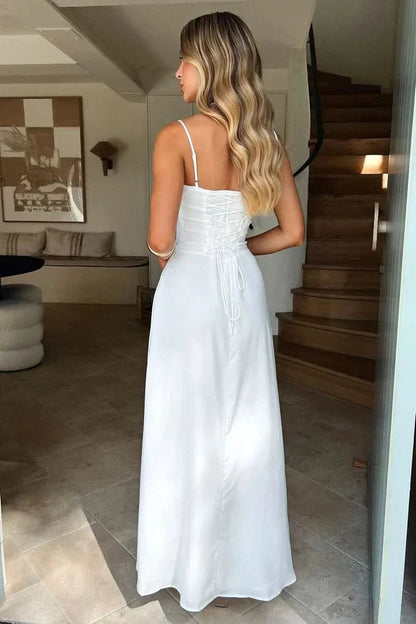 White maxi dress with gathered bust and thin shoulder straps