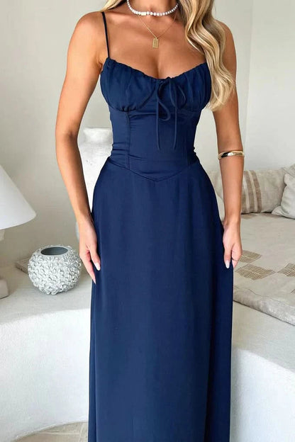 Navy blue maxi dress with tie-front corset bodice and spaghetti straps