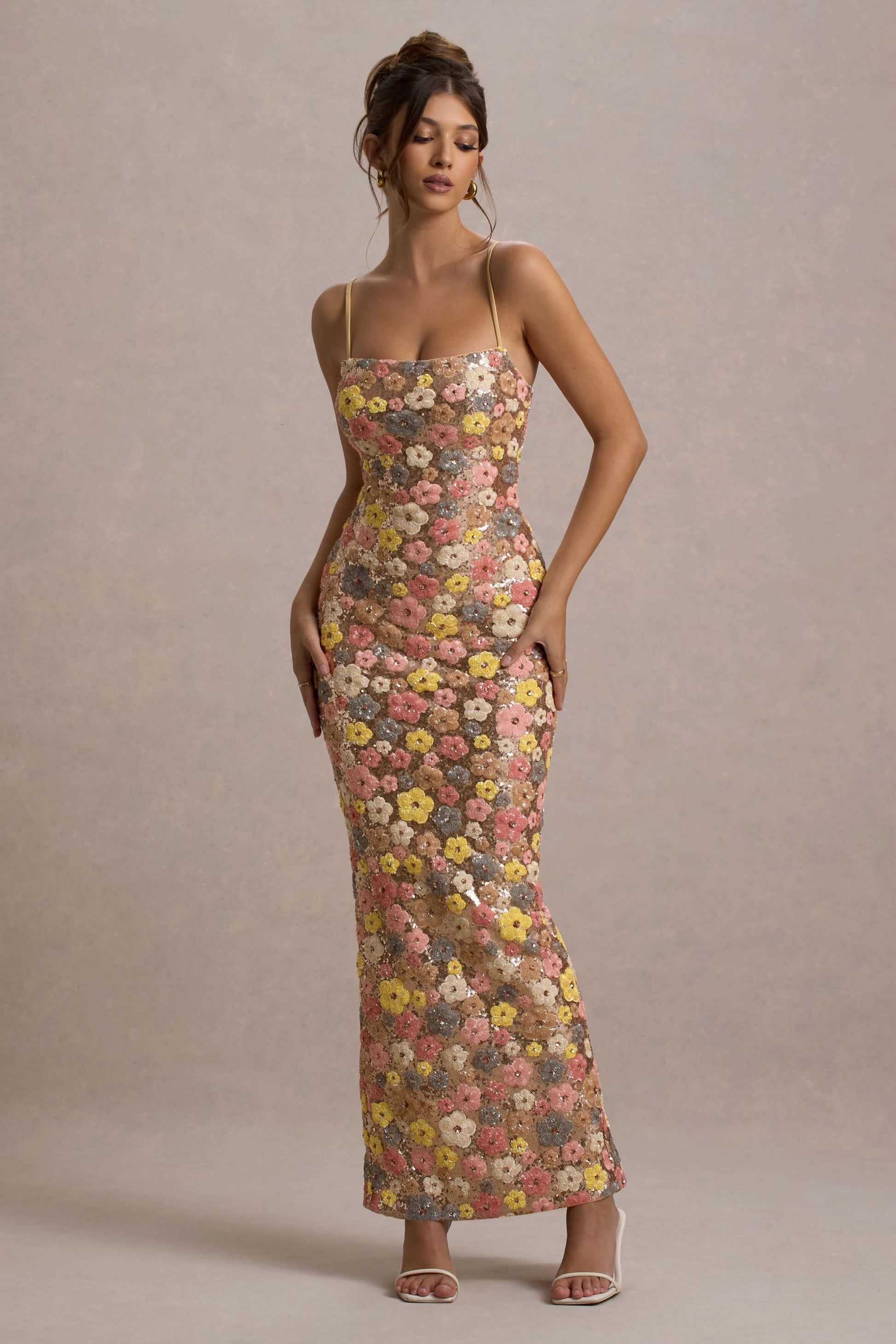 Floral sequin maxi dress for women with fitted bodycon silhouette and 3D flower embellishments, side profile