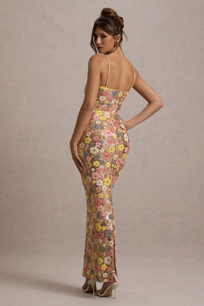 Women's formal floral sequin maxi dress showing back detail with crisscross spaghetti straps, rear view
