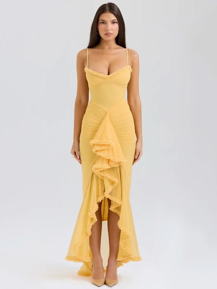 Yellow ruffled maxi dress with sweetheart neckline and asymmetrical ruffle trim