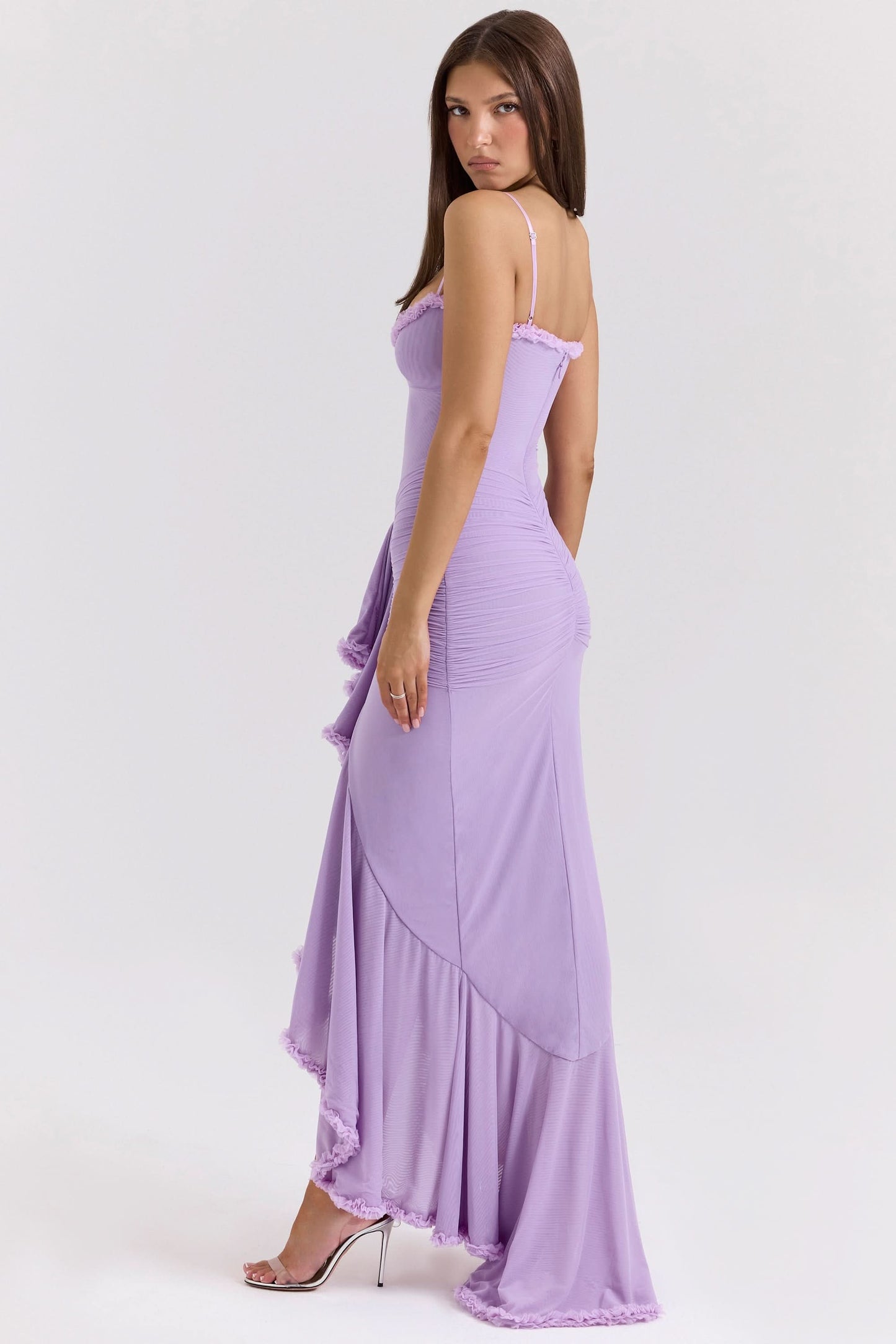 Side view of lavender maxi dress with layered ruffled asymmetrical skirt