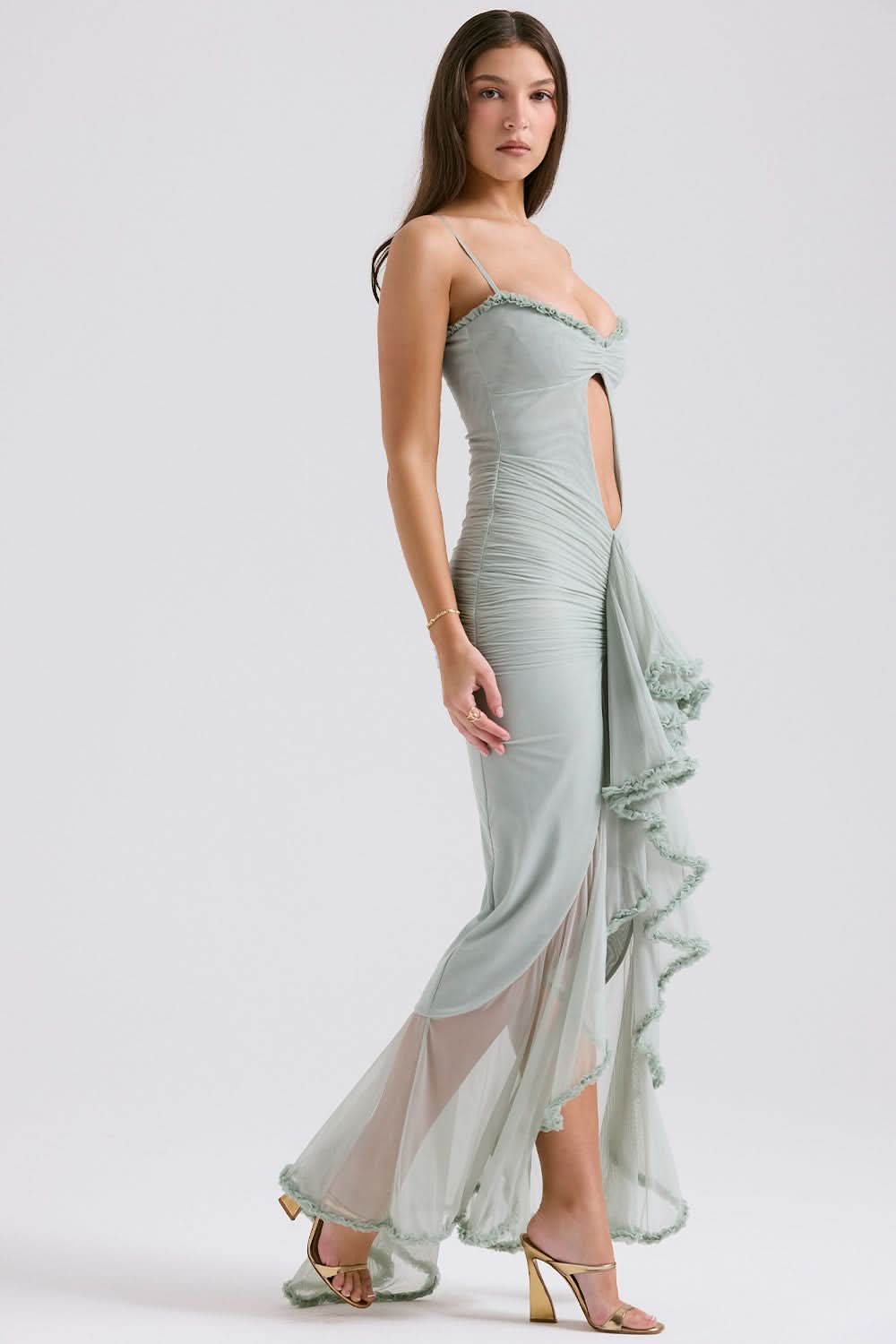 Sage green maxi dress with sweetheart neckline and lace-trimmed asymmetrical hem