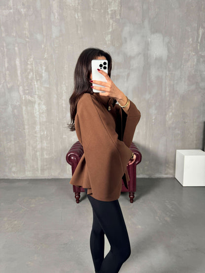 Camel brown poncho jacket side profile with brown leather belt accent