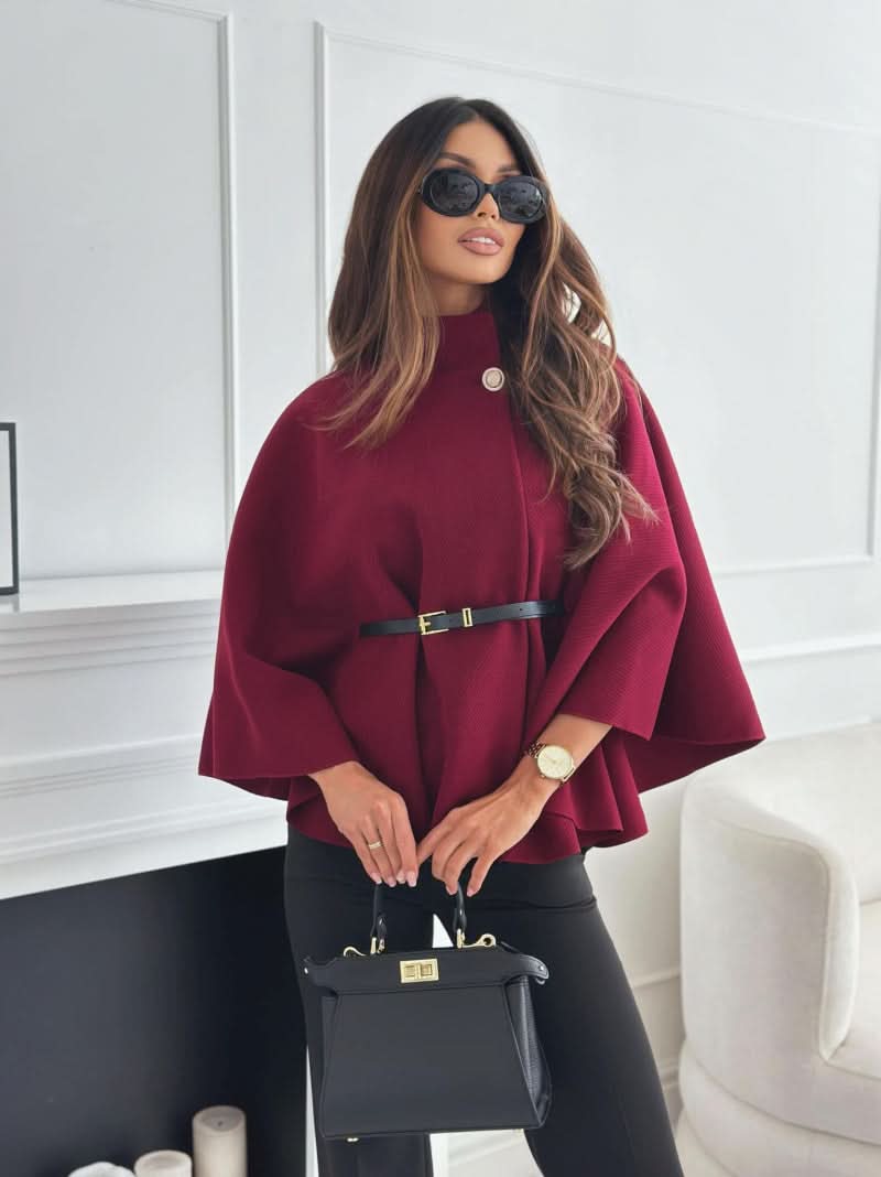 Burgundy belted poncho jacket styled with black belt and sunglasses