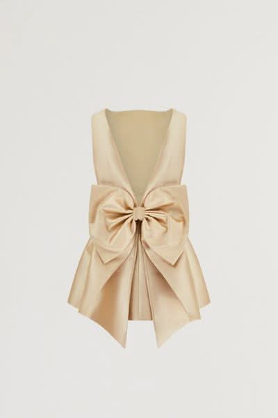 Cream sleeveless bow mini dress front and back flat lay detail