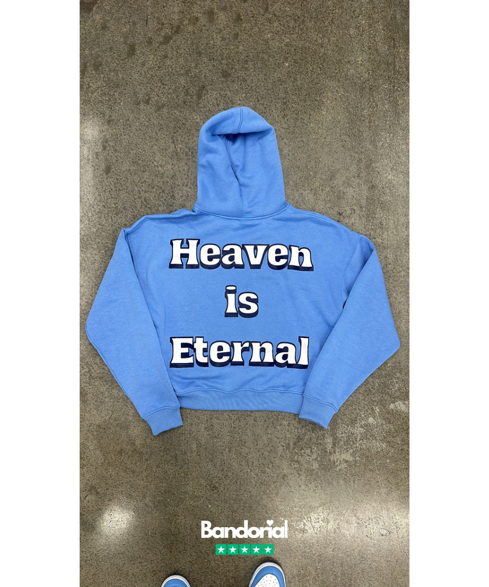 Periwinkle blue hoodie with white Heaven is Eternal back print