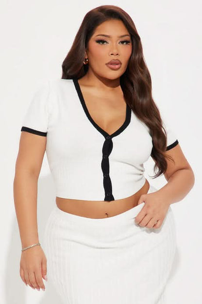 White ribbed button-front crop top with black trim and high-waisted midi skirt set