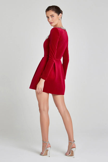 Back view of red velvet mini dress with crystal-trimmed neckline