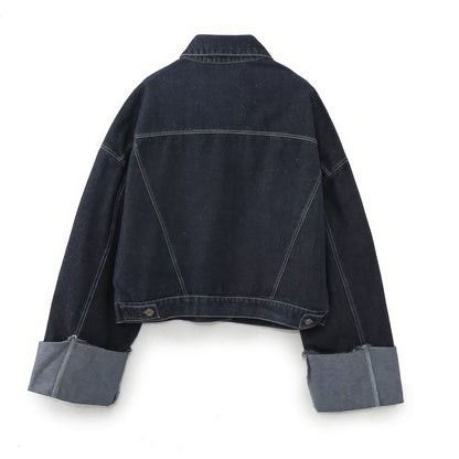 Dark denim jacket back view with collar, button front, and gray folded cuffs