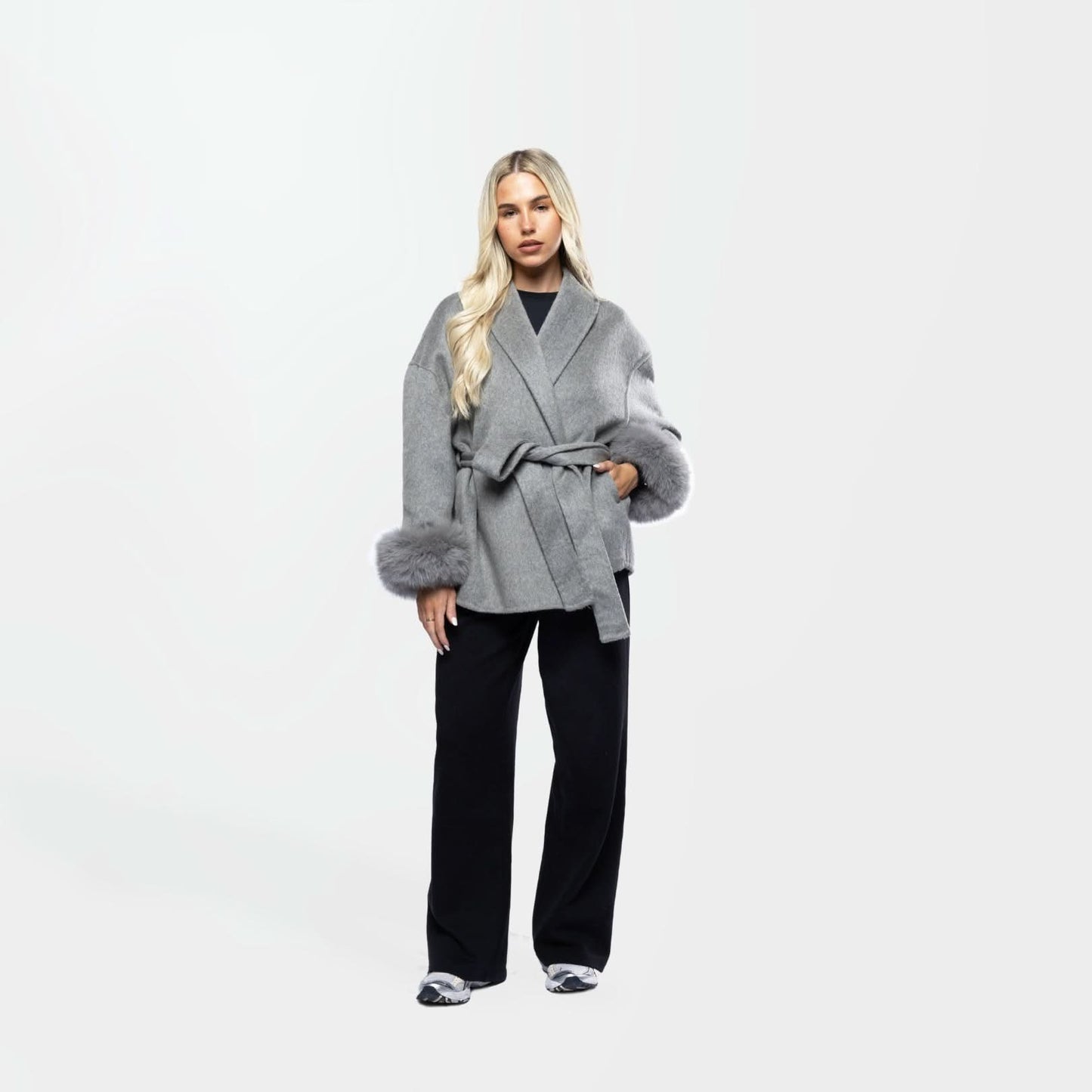 Gray wool coat with oversized collar and fur cuff details, front view