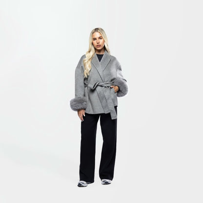 Gray wool coat with oversized collar and fur cuff details, front view