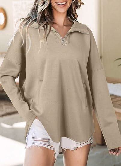 Cream quarter-zip hoodie with collared hood and front pockets