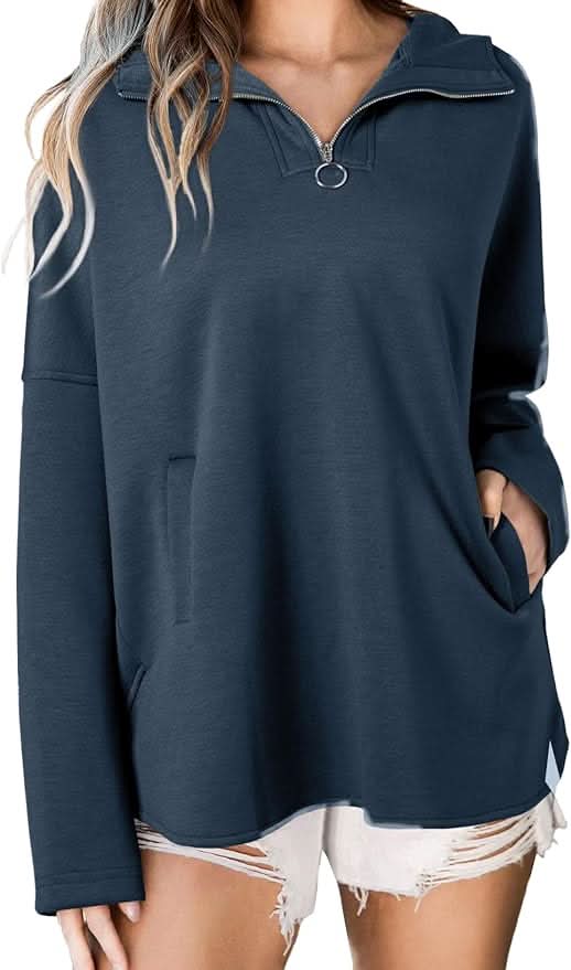 Navy blue quarter-zip hoodie with front pockets and relaxed silhouette
