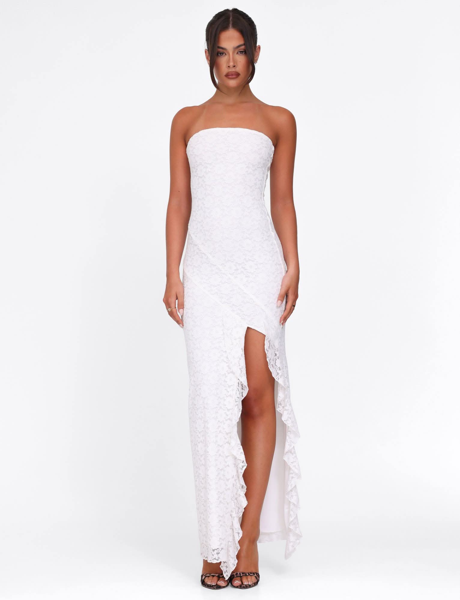 White lace strapless maxi dress with asymmetrical ruffle trim