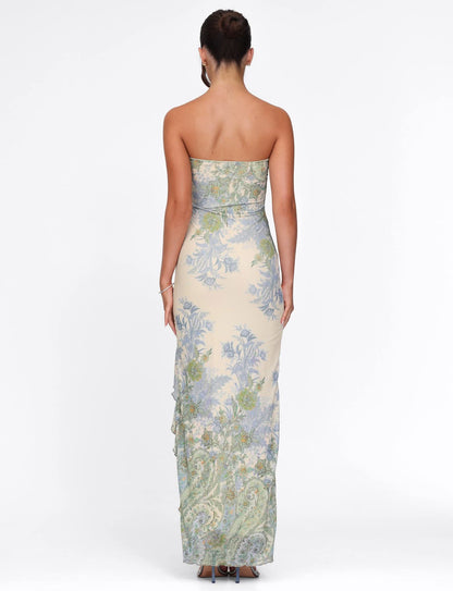 Back view of strapless cream maxi dress with blue and green floral pattern