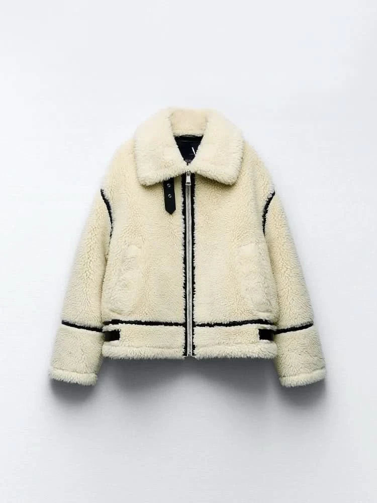 Front flat lay of cream teddy coat with oversized collar and black trim accents