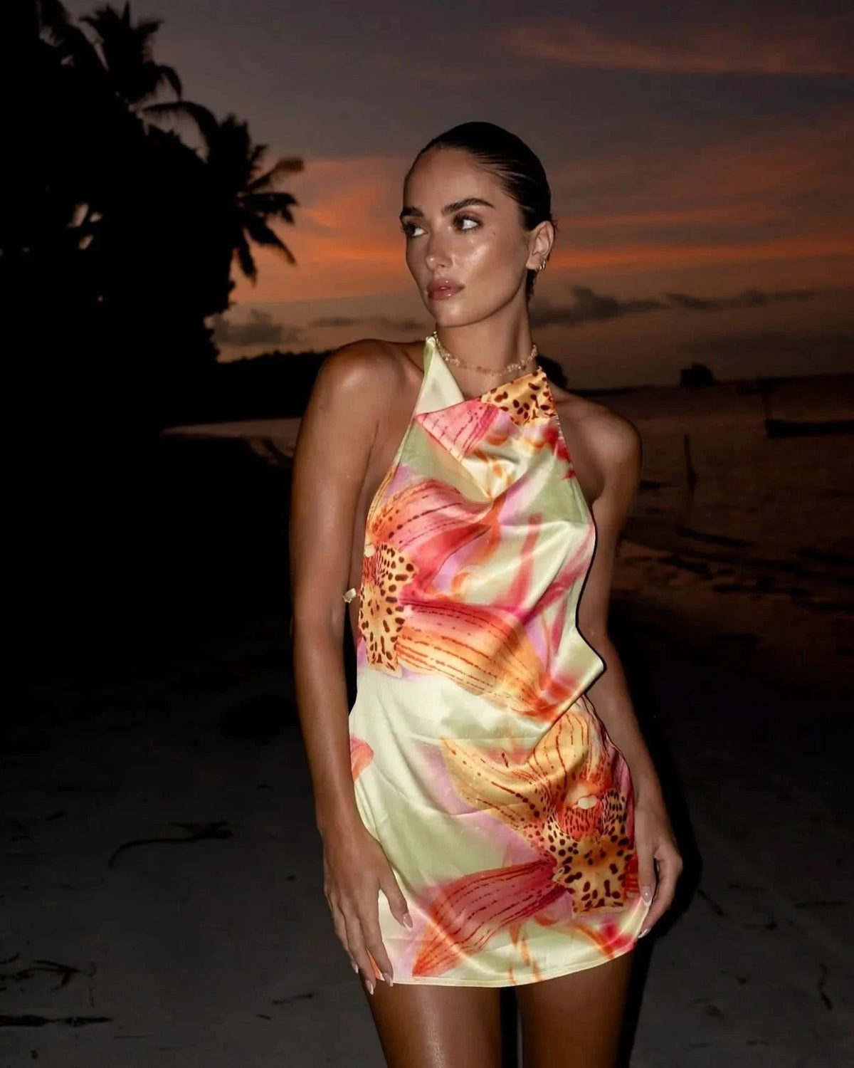 Cream floral mini dress with halter neckline and backless design for women
