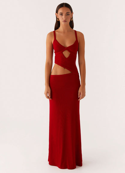 Front facing red maxi dress with heart-shaped chest cutout and V-neckline